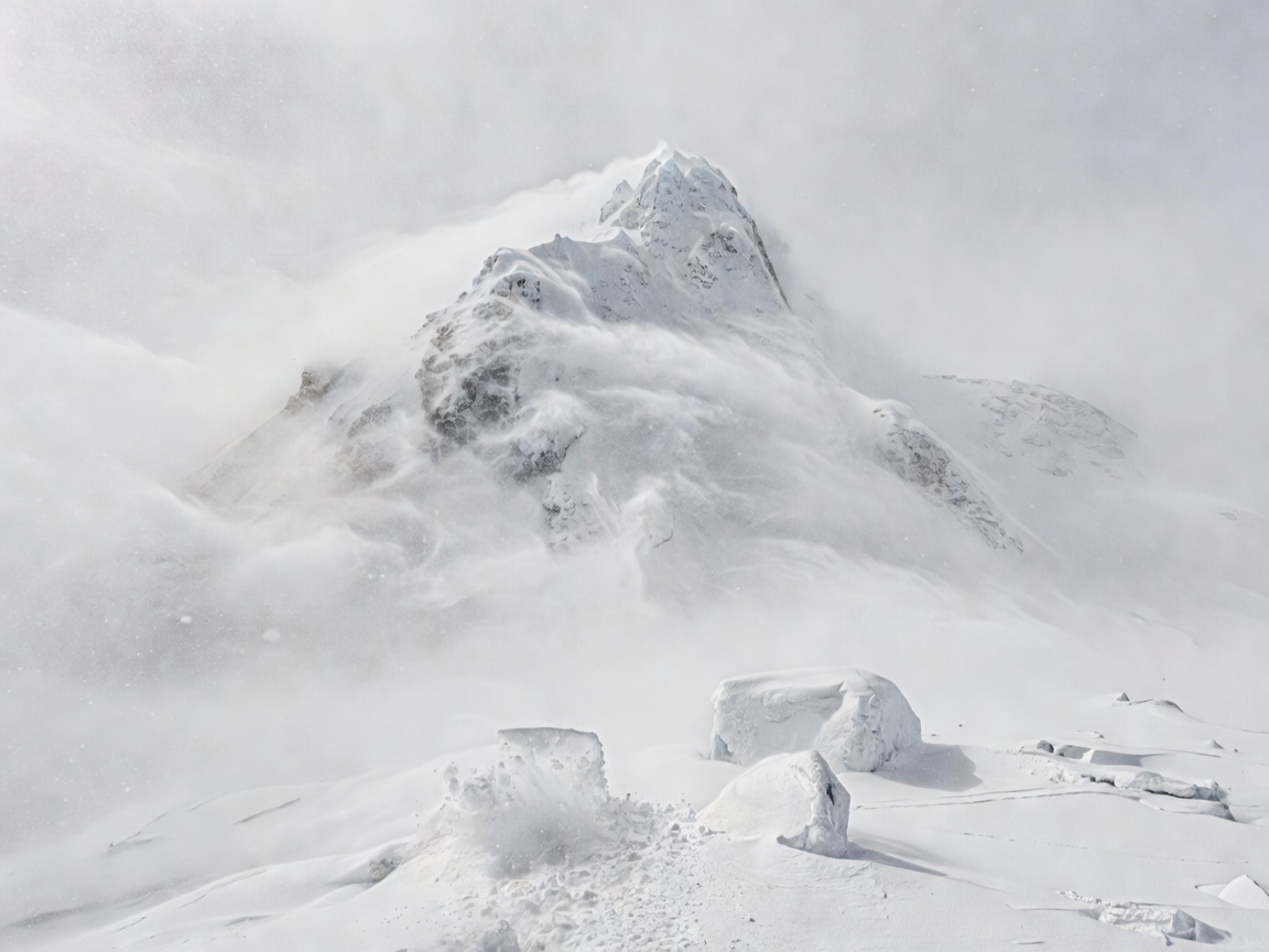 Ice peak landscape with severe blowing snow whiteout